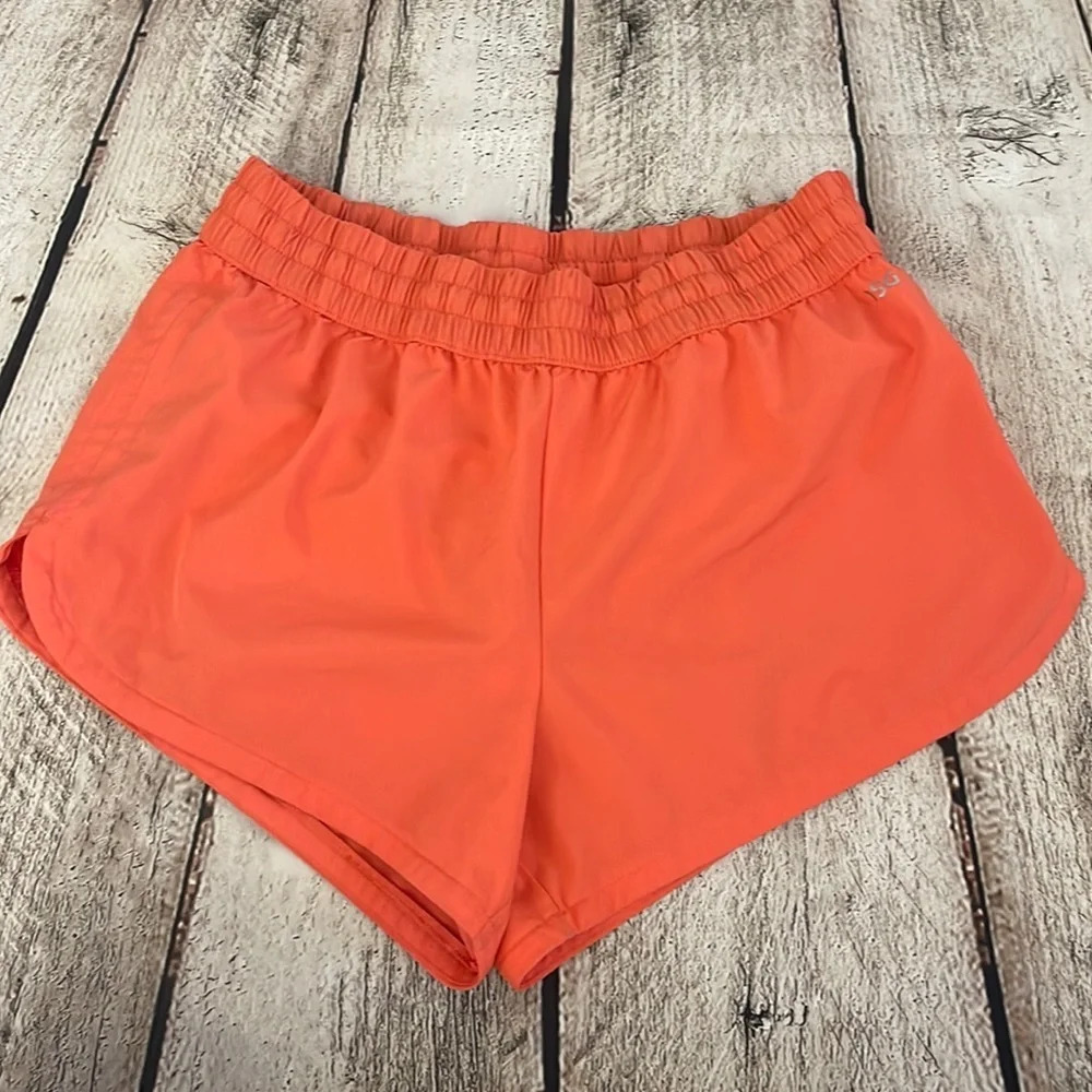 Women’s DSG orange lined shorts Small